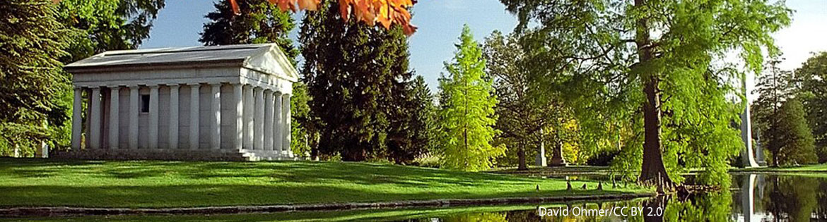 Classical Greek-style Fleischmann Mausoleum overlooking the lake at Spring Grove Cemetery