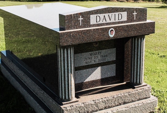 Pictured below is a single crypt granite mausoleum designed by Vince Dioguardi with a double base course that was built for the David Family