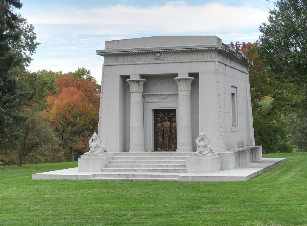 Types Of American Mausoleum Architectural Design Styles. American Private And Family Cemetery Mausoleum Design Styles Inspired By Classical Greek Architecture, Roman Temples, Egyptian Tombs & Gothic Churches. American mausoleum design styles include traditional stained glass, modern bronze doors, classical architecture, small private walk-in styles & large family estate interiors. Types of American mausoleum architectural styles include classical, walk-in, personalized family estate, private, public, community, garden, columbariums, Art Deco, Gothic, Romanesque and Egyptian.