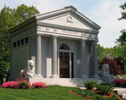 American mausoleum design styles include traditional stained glass, modern bronze doors, classical architecture, small private walk-in styles and large family estate interiors. 
