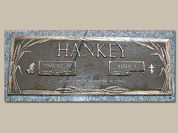 Buy A Custom Bronze Grave Marker | $595+ | Free Shipping | The bronze is actually a flat plate that is affixed to the face of a flat granite marker.