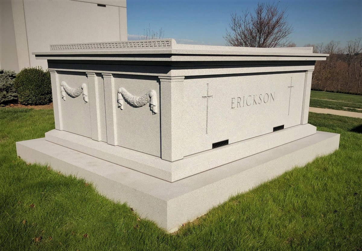Mausoleums are above ground structures that contain the crypt or crypts of the deceased. They can be as simple as a granite “butter dish”-style mausoleum that is just large enough to cover a coffin or casket.