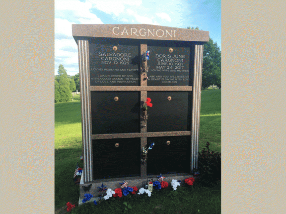 Pictured here is a six crypt private family mausoleum built with mahogany granite, designed by Vince Dioguardi and constructed by Rome Monument mausoleum builders