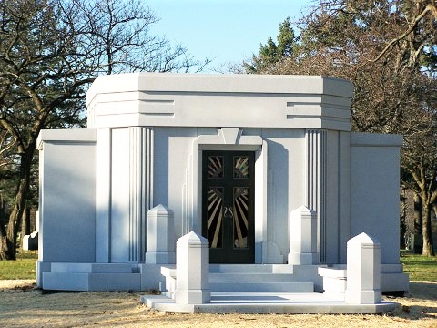 This beautiful private walk-in mausoleum built for the Flynn family was designed in a sleek Art Deco architectural style  March 19 2023 Rom Monument
